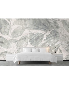 Fototapeta na wymiar z delikatnym motywem liści w jasnych odcieniach beżu i szarości, subtelna dekoracja ścienna.