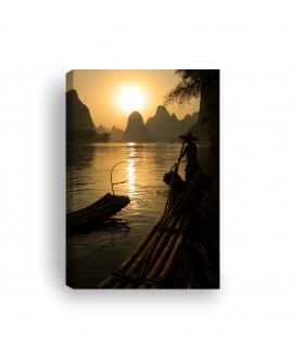 Obraz na płótnie canvas pionowy zachód słońca rybacy łodzie góry studiograf