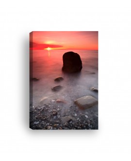 Obraz na płótnie canvas pionowy zachód słońca czerwień skały morze studiograf